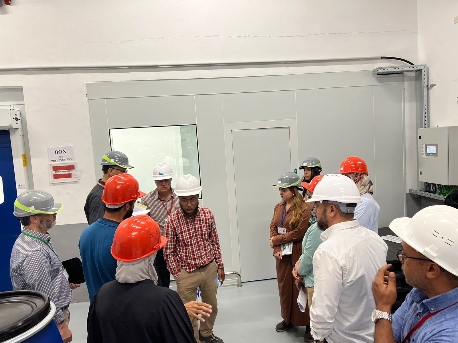 Team technique en visite of site illustrant the implementation d'actions and the follow-up opérationnel.